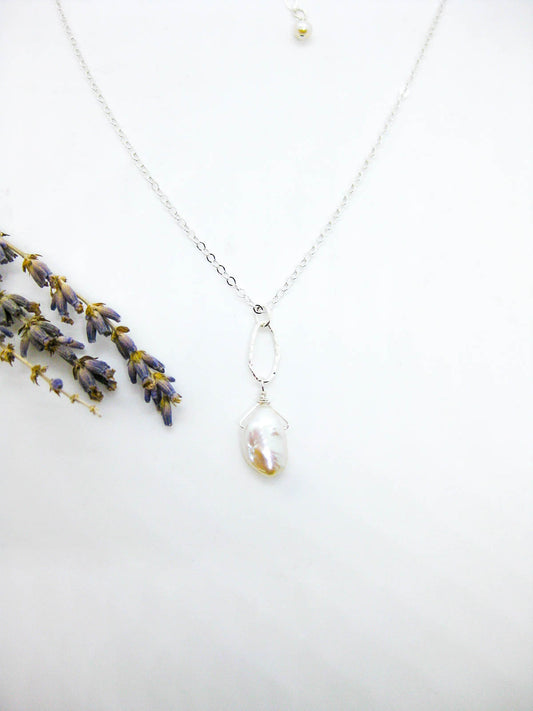Chrysanthe: Pearl Necklace