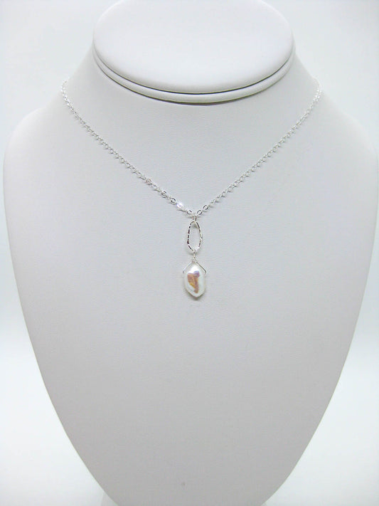 Chrysanthe: Pearl Necklace